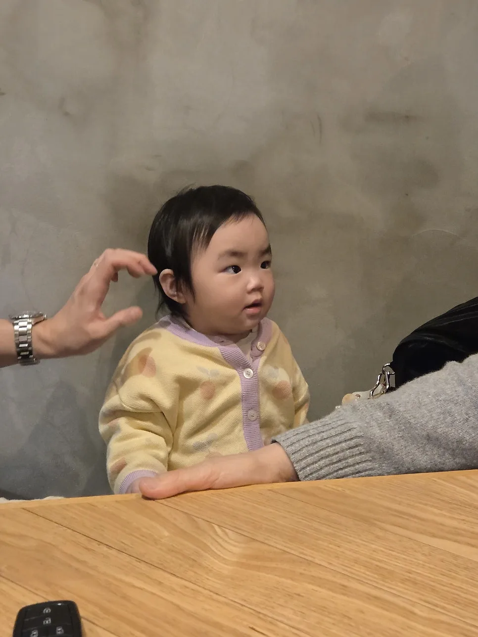 Baby waking up at the cafe